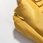 Neckholder-Kleid mit Blumen-Verzierung