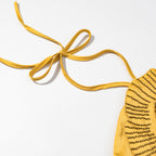 Neckholder-Kleid mit Blumen-Verzierung